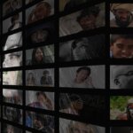 mulher reflete sobre governos socialistas olhando vários rostos